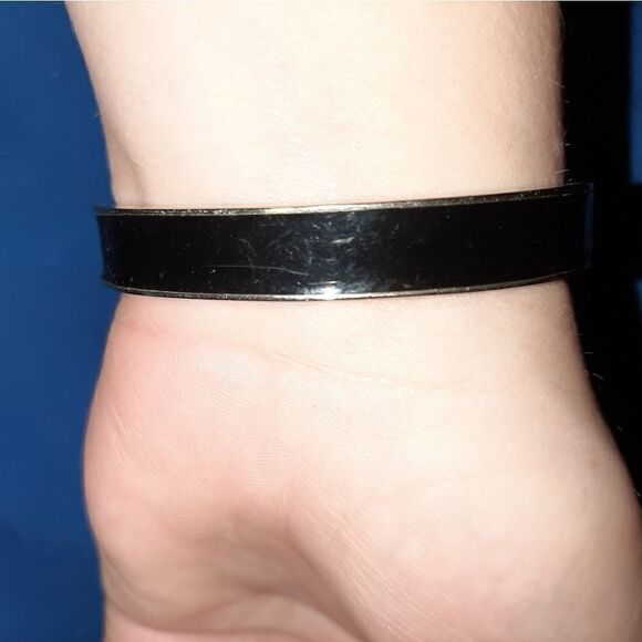 Black and silver hinged bangle watch